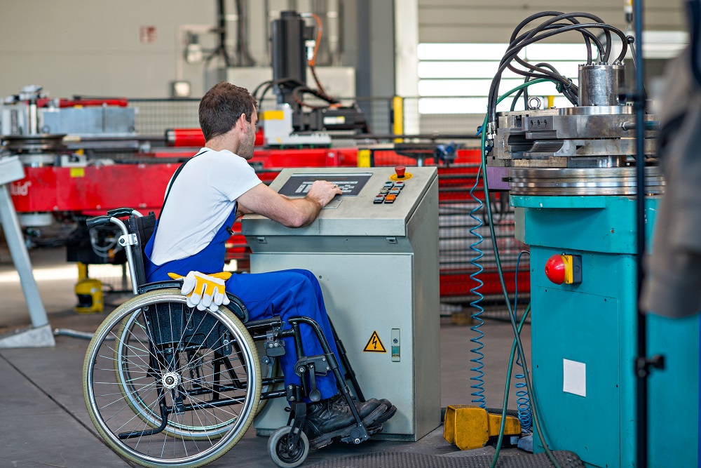 Man Works in Factory