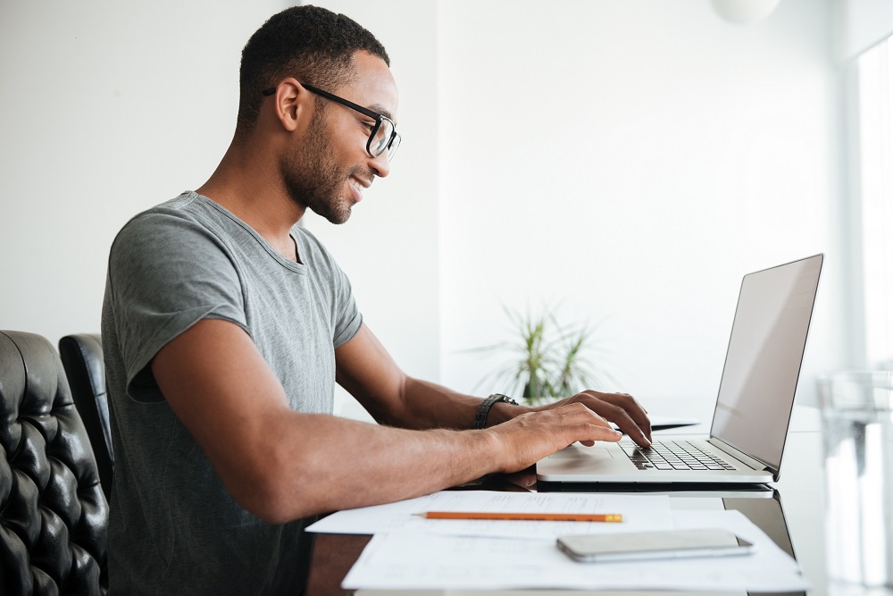 Guy on Laptop|Woman Checks Mail