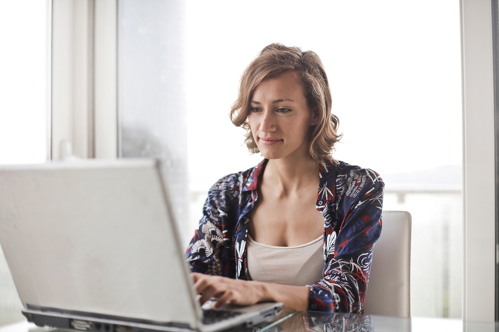 Woman working from home|Laptop on desk