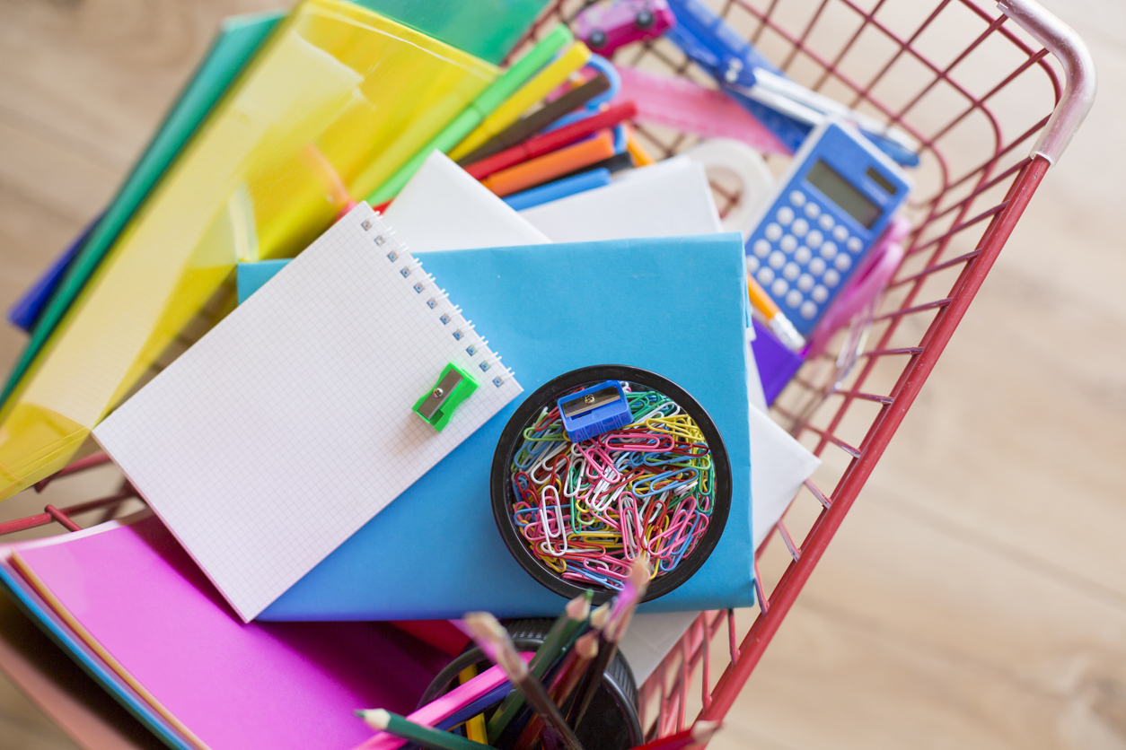 Shopping basket with school supplies