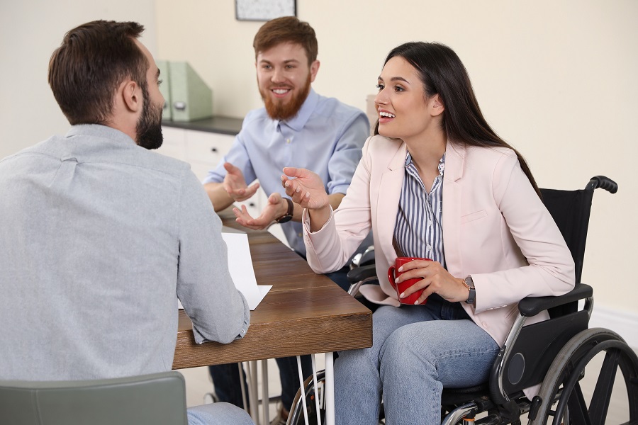 Group of People with Disabilities Smiling|