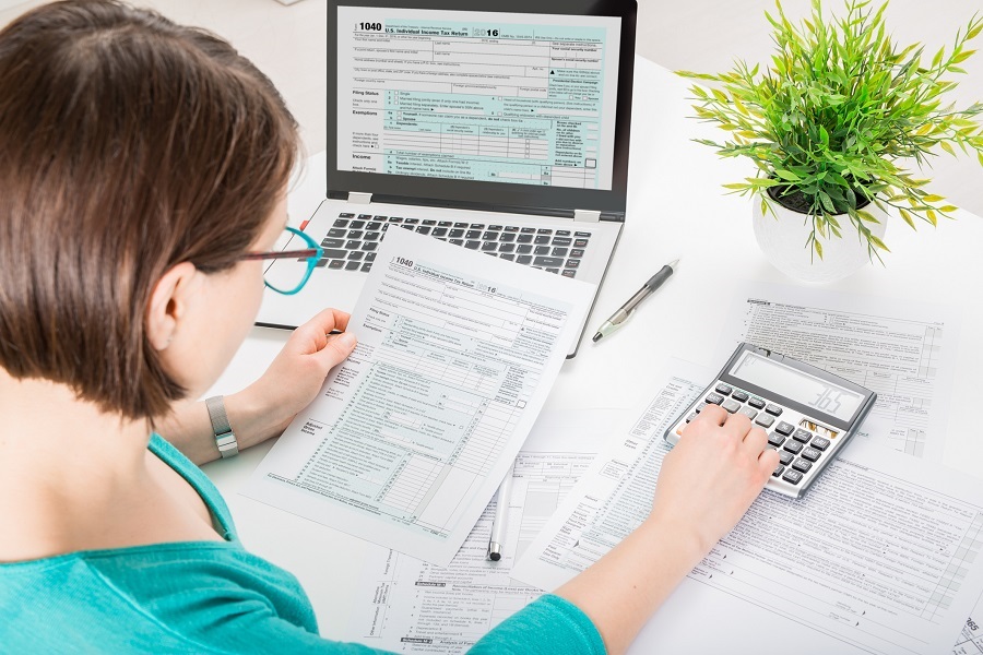 Woman Filling Out Her Taxes