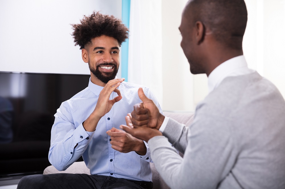 Businessmen Using Sign Language|Man Holding Network of People