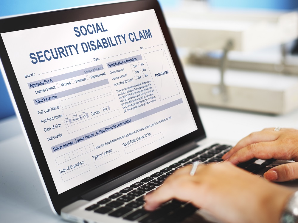 Person Applying For Social Security Benefits on Laptop