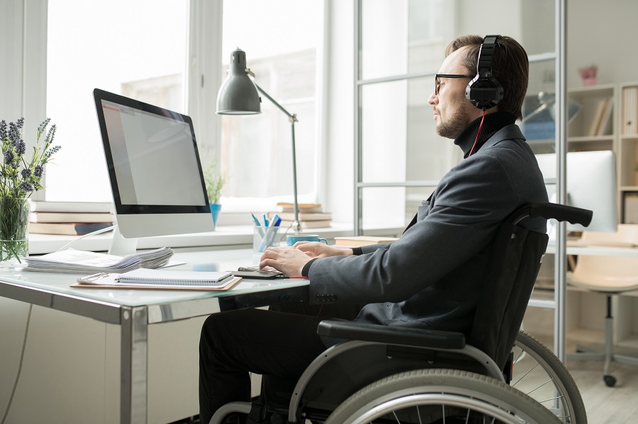 Businessman in Wheelchair Working|Opening Envelope with Paycheck