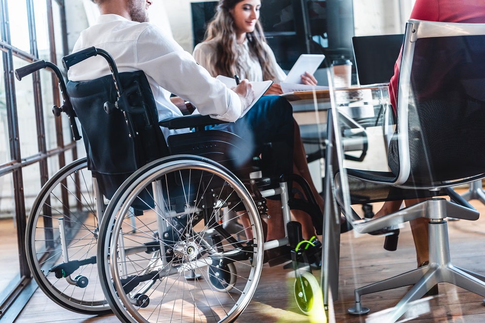 Man in Wheelchair Working